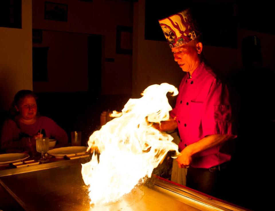 WOODY MARSHALL/THE TELEGRAPHMacon, Georgia, 11/20/2015:Hibachi chef Kenny entertains the diners with fire at Mikata Japanese Steakhouse and Sushi Bar