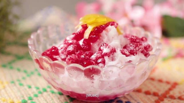 Red Ruby with shaved ice and coconut milk, topped with red ruby and dried fruits