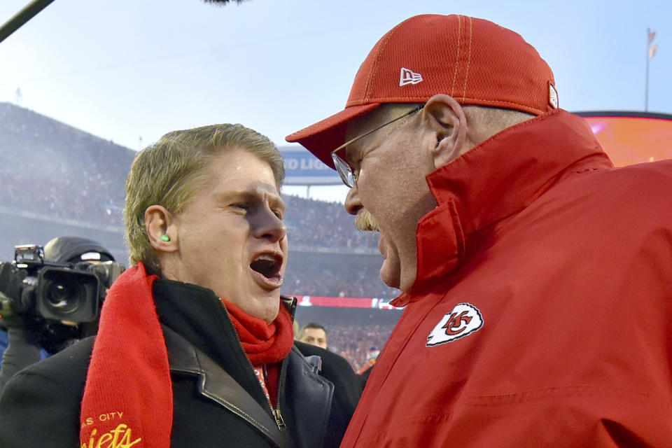 Clark Hunt, part owner, chairman and CEO of the Kansas City Chiefs, left, celebrates with Kansas City Chiefs head coach Andy Reid after the NFL AFC Championship football game against the Tennessee Titans Sunday, Jan. 19, 2020, in Kansas City, MO. The Chiefs won 35-24 to advance to Super Bowl 54. (AP Photo/Ed Zurga)