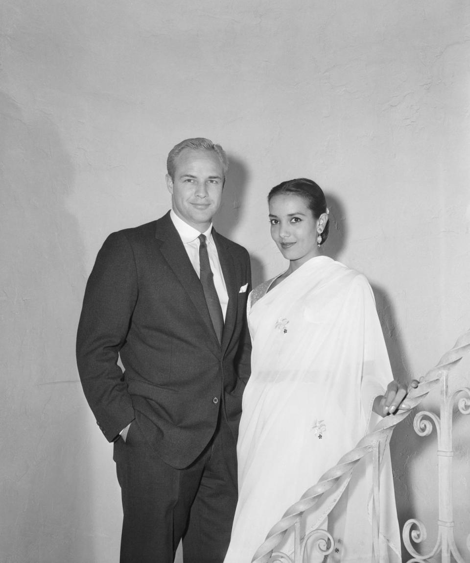 <p>On October 11, Marlon Brando, 33, wed Anna Kashfi, 23, an Indian actress, in Eagle Rock, California. They married at the home of Brando's aunt, Mrs. Betty Lindmeyer. They divorced in 1959, after having a son together.</p>