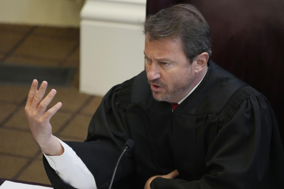 Mississippi Supreme Court Associate Justice James D. Maxwell II asks a question of lawyers during their arguments on the constitutionality of a Mississippi law that would authorize some judges who would be appointed in a state where most judges are elected, Thursday, July 6, 2023, before the state supreme court in Jackson, Miss. (AP Photo/Rogelio V. Solis)