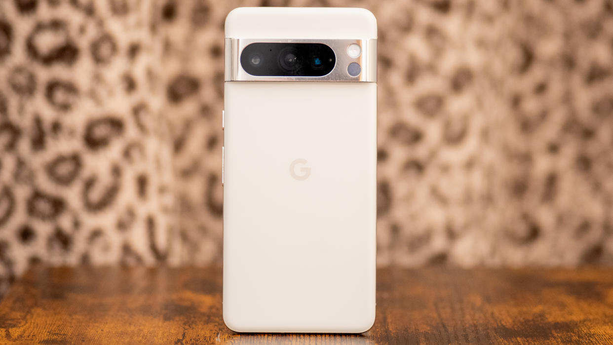  Google Pixel 8 Pro back in porcelain in front of animal print. 