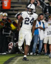 Penn State running back Keyvone Lee (24) celebrates after a touchdown against Purdue during the second half of an NCAA college football game in West Lafayette, Ind., Thursday, Sept. 1, 2022. Penn State won Purdue 35-31. (AP Photo/Michael Conroy)