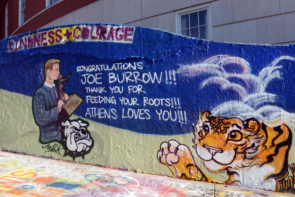 A mural congratulating LSU quarterback and Heisman Trophy winner Joe Burrow was painted on the Ohio University campus in Athens. Burrow, an Athens High grad, raised awareness to the poverty and hunger issues in Athens County with an emotional speech, triggering a nationwide fundraising effort that brought more than $350,000 to the Athens County Food Bank