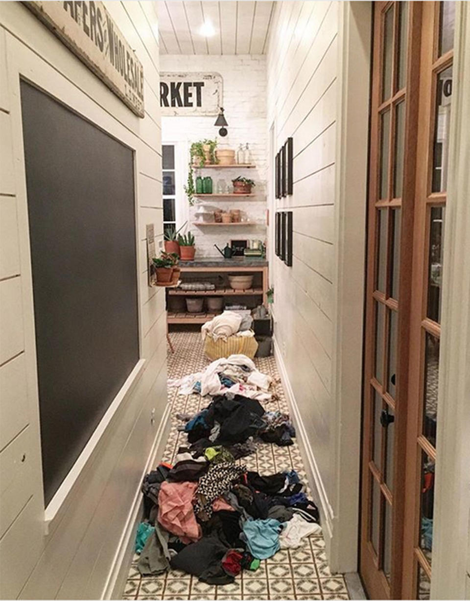 <p>Chip and Jo are only human! "Unpacking & loads of laundry both have a way of bringing things back to reality after a fun family vacation," Joanna said when sharing this relatable look into her super-cute laundry space.</p>