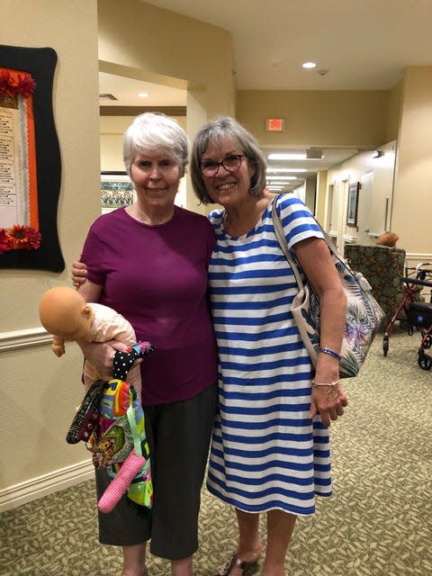 Margaret Taggart, left, and her sister Claire Harrison at Legend of Mansfield. Harrison said that Legend Senior Living charged her more than $2,000 in added fees after Taggart tested positive for COVID-19 in April.