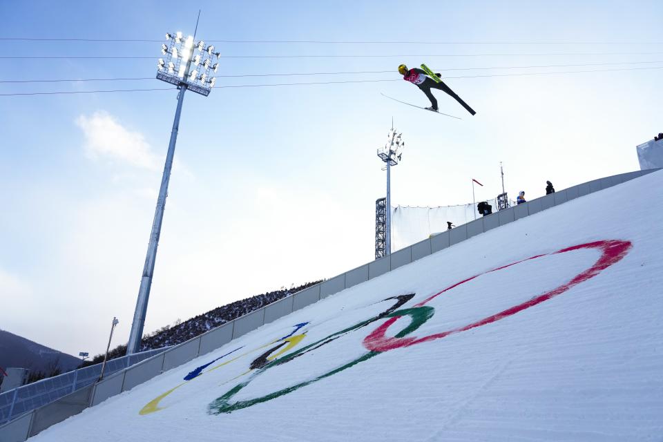 Jens Luraas Oftebro, of Norway, soars through the air during the competition round of the individual Gundersen large hill/10km ski jumping competition at the 2022 Winter Olympics, Tuesday, Feb. 15, 2022, in Zhangjiakou, China. (AP Photo/Andrew Medichini)