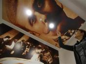 Hotel manager Emela Burdzovic points to a portrait of Austrian Archduke Franz Ferdinand on the ceiling at the Franz Ferdinand hostel in Sarajevo, January 29, 2014. REUTERS/Dado Ruvic