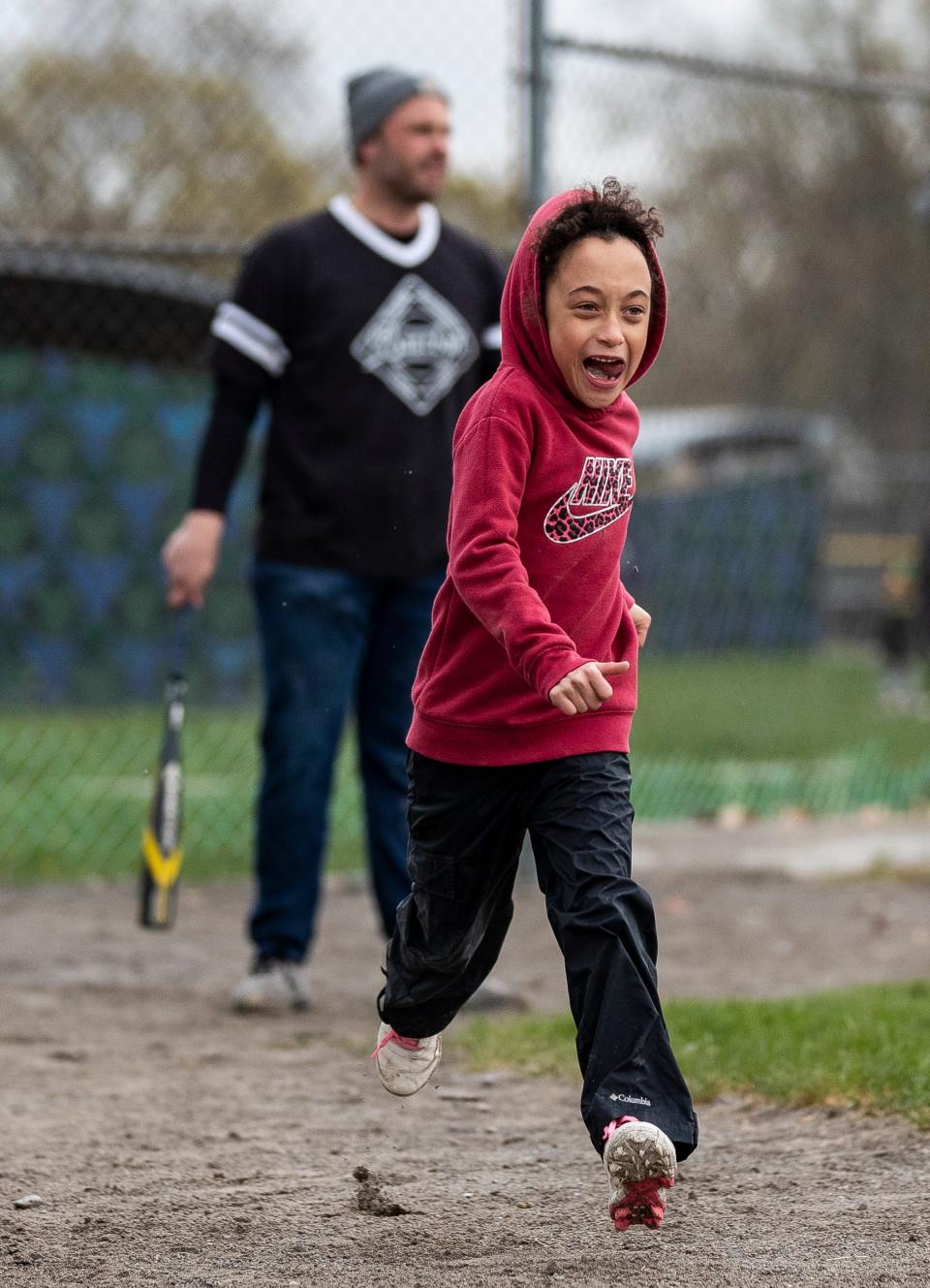 Monarchs' Maya Schneider runs for the first base during practice at Stoepel Park in Detroit on Tuesday, April 25, 2023.