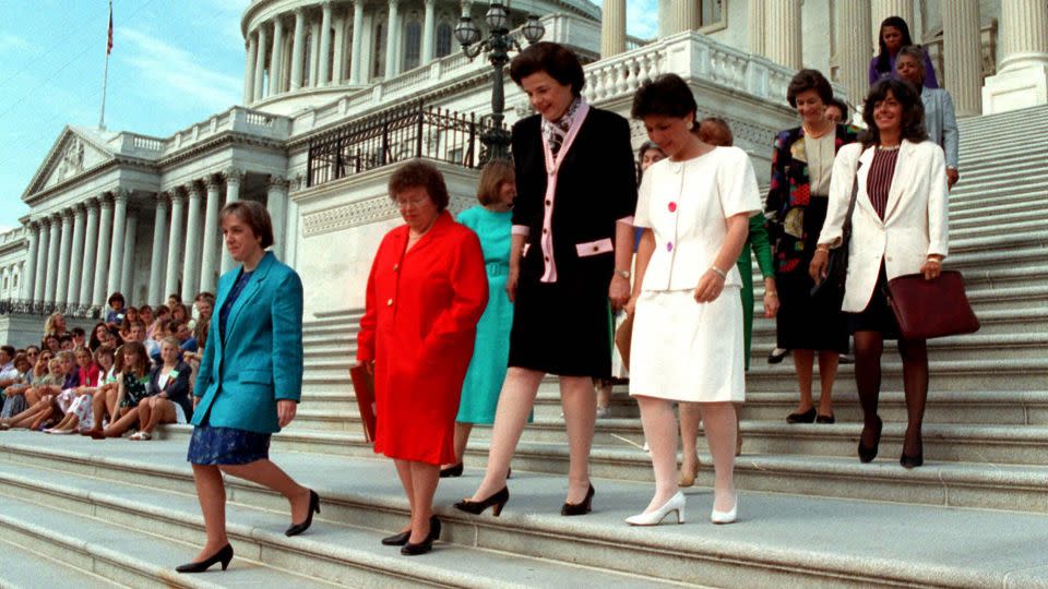 Sen. Patty Murray, D-Wash., left, leads a group of woman senators and others, down the steps of the Capitol July 21,1993 to a news conference to announce their opposition against restrictions on abortion coverage in federal appropriations bills. - Charles Tasnadi/AP