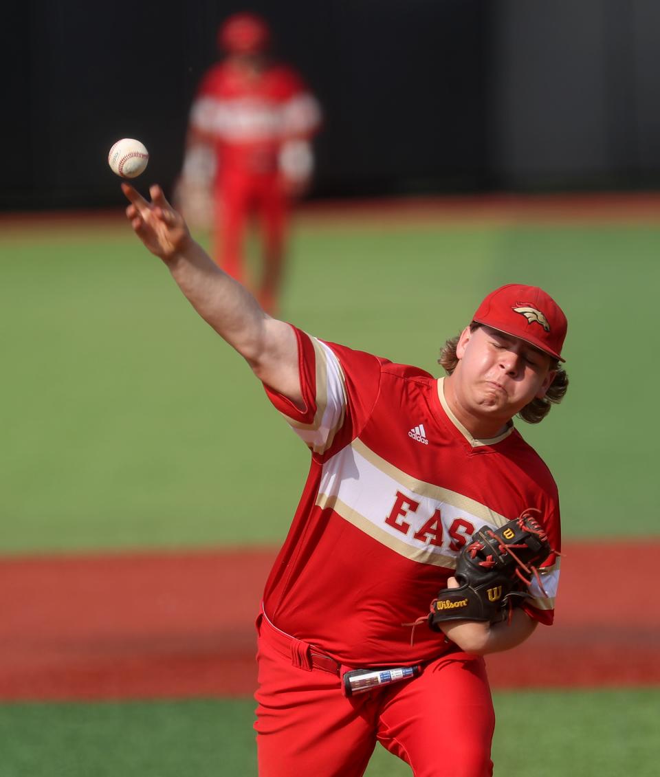 Bullitt East’s Taylan Hayden throws the ball home against Southern in the Region Sixth Baseball Tournament.May 24, 2023 