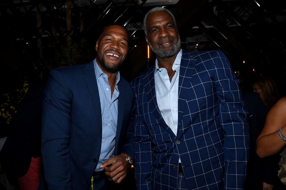 Michael Strahan and Charles Oakley