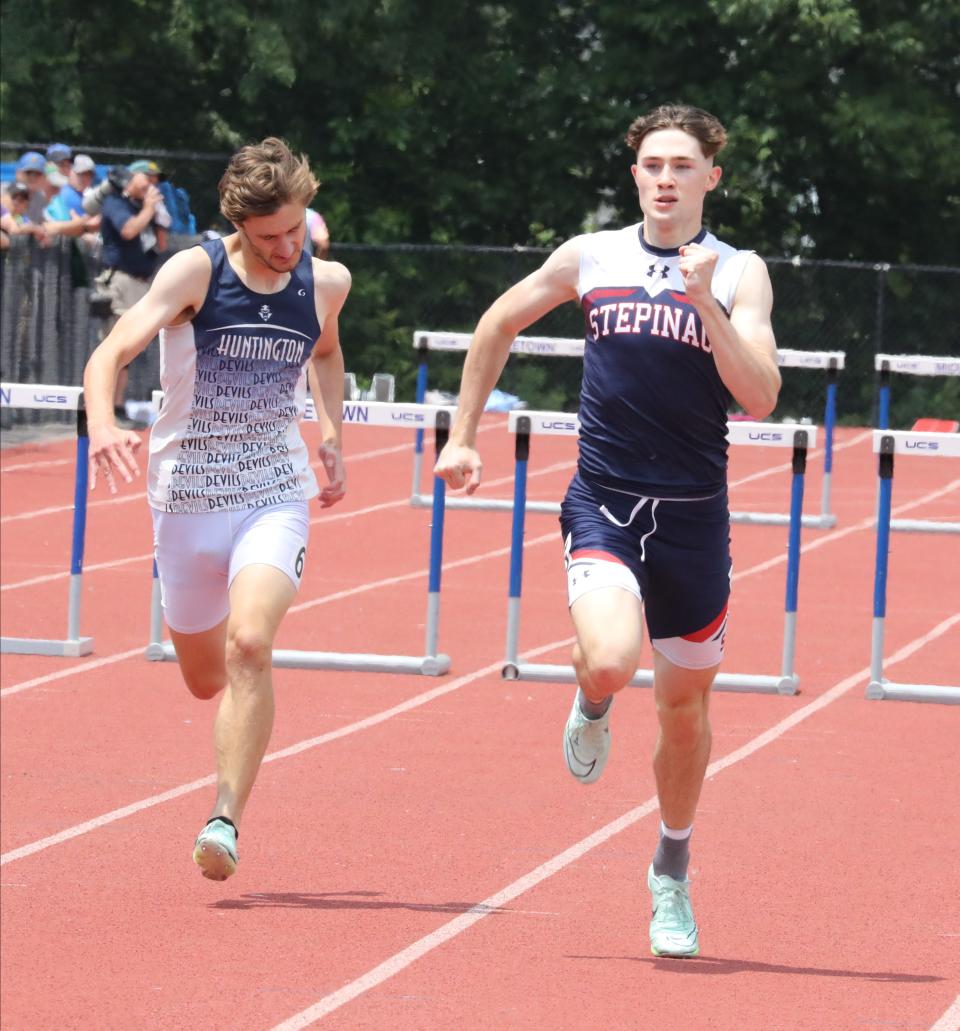 Archbishop Stepinac's David Davitt competes in the boys 400 meter hurdles championship during the New York State Track and Field Championships at Middletown High School, June 10, 2023.