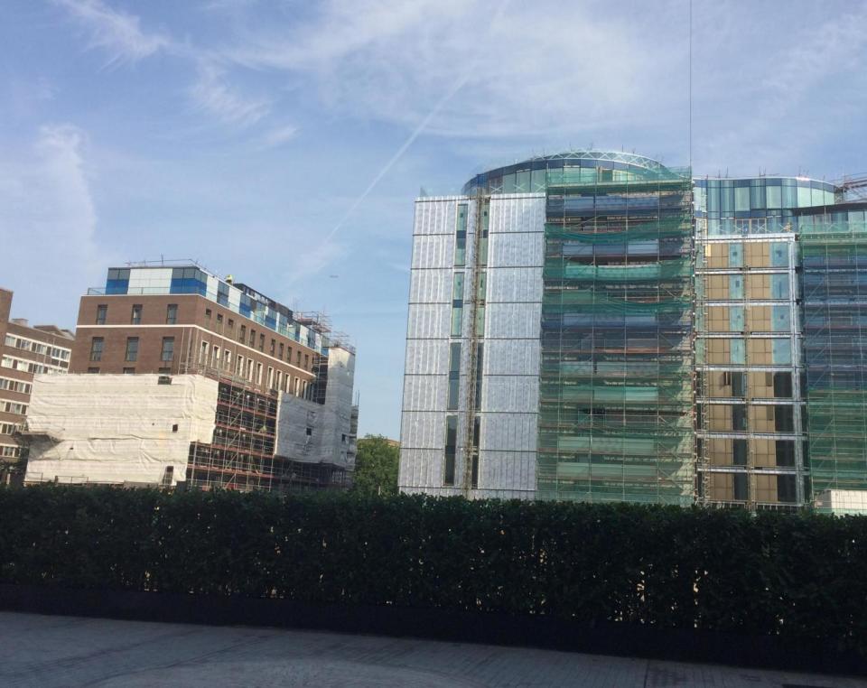 The building on the far left may be one of the blocks reserved for social housing tenants (Lucy Pasha-Robinson/Independent)