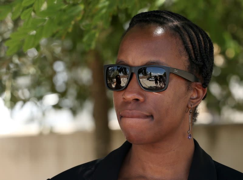 Janice McAfee, a wife of John McAfee, speaks to media as she leaves the Brians 2 prison in Sant Esteve Sesrovires