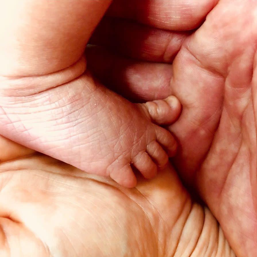 America Ferrera and her husband Ryan Piers Williams welcomed their first child into the world with a sweet photo. The actress shared an image of Sebastian Piers Williams' foot with her and Ryan's hands on May 29, 2018. "When 2 become 3... Welcome Sebastian Piers Williams - aka Baz! Mom, Dad, and Baby are happy, healthy and totally in love!" she captioned the picture.