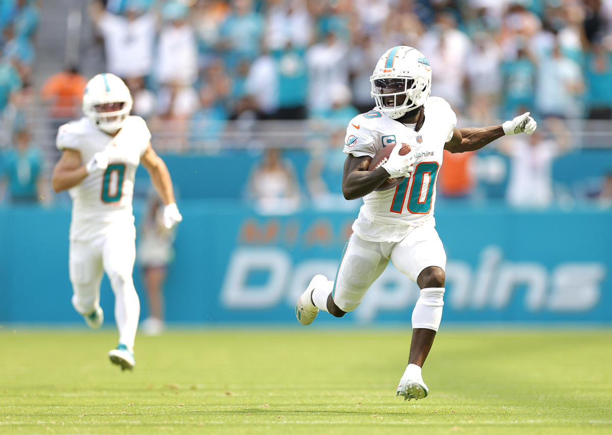 Tyreek Hill sets NFL record on 54-yard TD strike from Tua Tagovailoa in  historic day for Dolphins offense