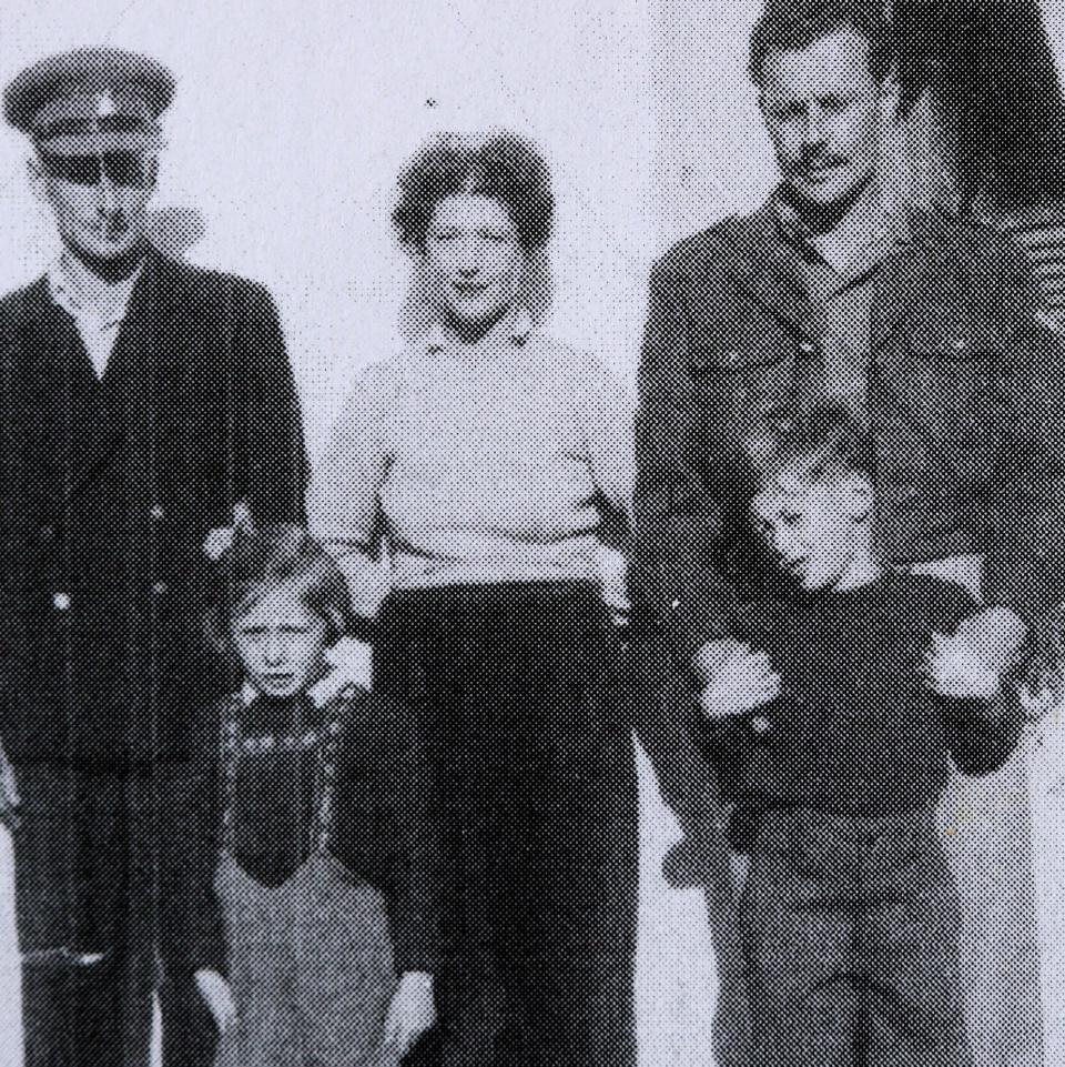 Roger, bottom right, with his his father (left), his mother (centre), his sister (bottom left) and a family friend (top right) shortly after they were rescued