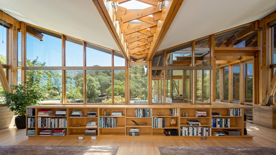 Towering rooflines and floor-to-ceiling windows bring light and nature within.