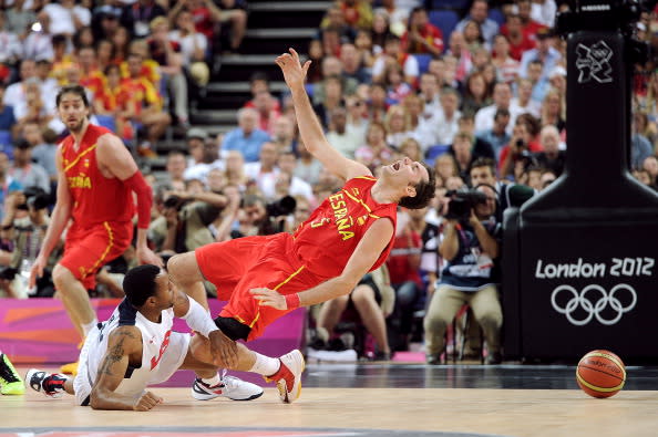 LONDON, ENGLAND - AUGUST 12: Andre Iguodala #9 of the United States fouls Rudy Fernandez #5 of Spain during the Men's Basketball gold medal game between the United States and Spain on Day 16 of the London 2012 Olympics Games at North Greenwich Arena on August 12, 2012 in London, England. (Photo by Harry How/Getty Images)