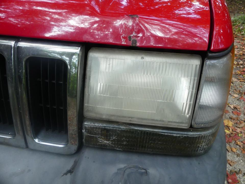 A good-sized dent in James Alexander Thom and his wife Dark Rain's 1998 Jeep Cherokee.