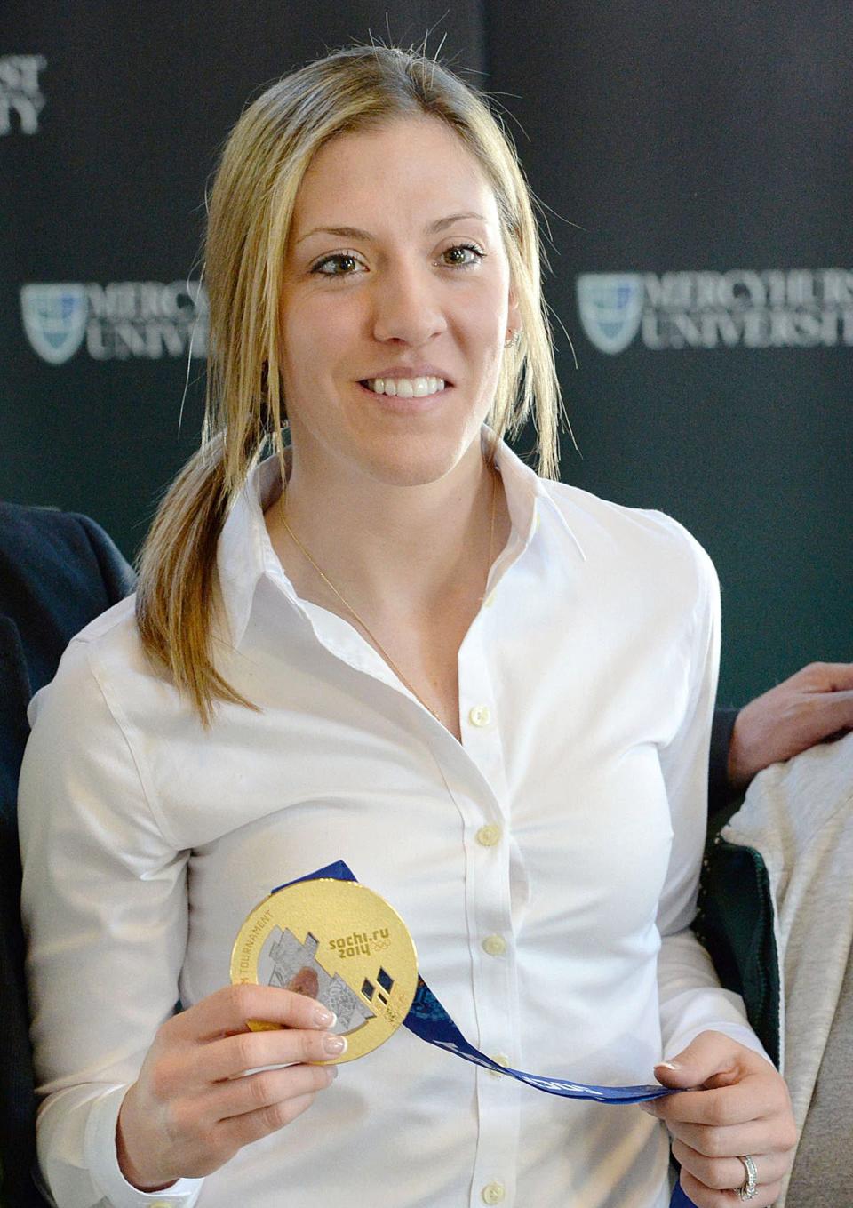 Three-time Olympic hockey gold medalist and former Mercyhurst University star Meghan Agosta-Marciano, then 27, displays her gold medal from Sochi, Russia during an autograph session at the Erie school on March 7, 2014. Agosta was a forward on the Division I Mercyhurst women's hockey team from 2006 -2011. She starred for the Canadian national hockey team, helping Team Canada win gold medals in Turin, Italy in 2006; Vancouver, Canada in 2010; Sochi, Russia in 2014 and a silver medal in Pyeongchang, South Korea in 2018. In Sochi, Agosta was Canada's top scorer with nine goals and six assists.