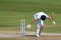 Cricket - India v England - Second Test cricket match - Dr. Y.S. Rajasekhara Reddy ACA-VDCA Cricket Stadium, Visakhapatnam, India - 21/11/16. England's Joe Root is dismissed by India's Mohammed Sham. REUTERS/Danish Siddiqui