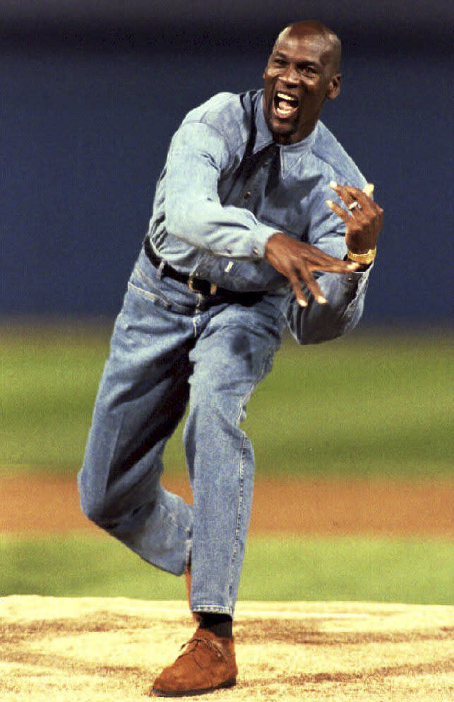 Michael Jordan throws out the first pitch at an American League Championship Series game between the Chicago White Sox and Toronto Blue Jays on Oct. 5, 1993, in Chicago, Illinois. (Photo credit should read CHRIS WILKINS/AFP via Getty Images)