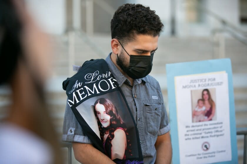 LOS ANGELES, CA - OCTOBER 27: Oscar Rodriguez the brother of 18-year-old Mona Rodriguez, who was shot by a Long Beach Unified School District safety officer, joined the family's attorneys continue to call for justice after Los Angeles County District Attorney George Gascon announces charges against Eddie F. Gonzalez, 51, on Wednesday, Oct. 27, 2021 in Los Angeles, CA. (Jason Armond / Los Angeles Times)