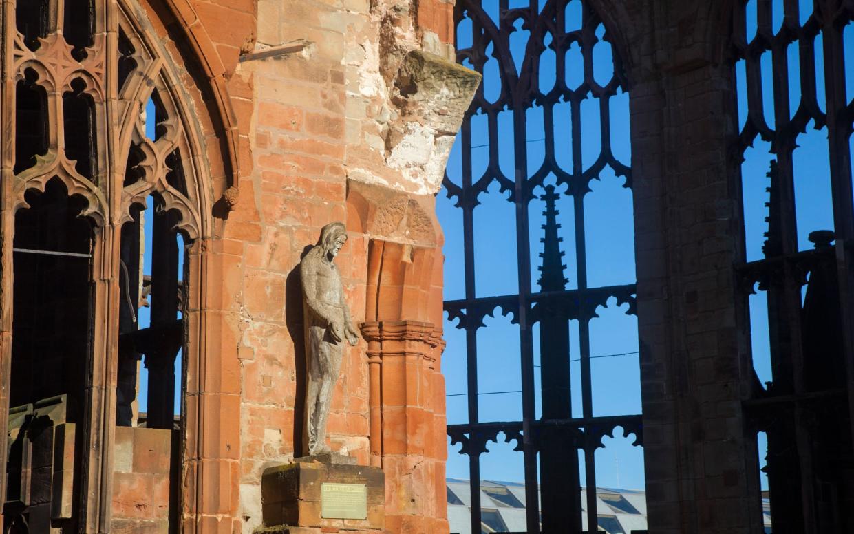 The ruins of Coventry's old cathedral remain as a visitor site adjacent to a new cathedral built in the 1950s - This content is subject to copyright.