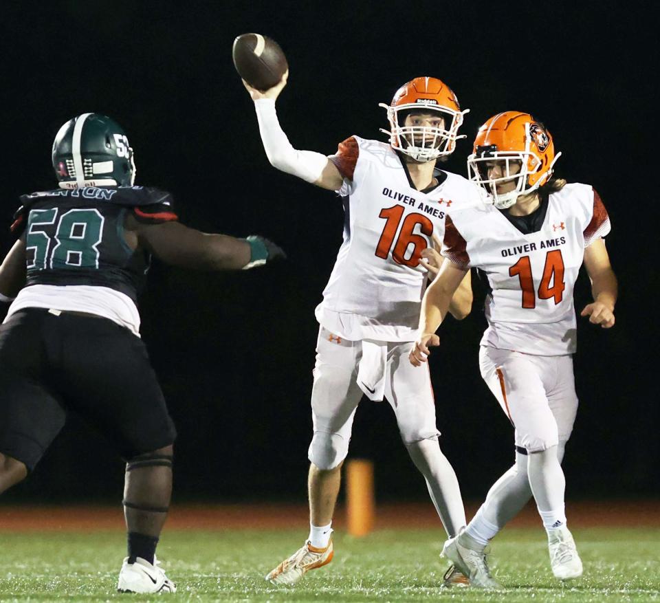 Oliver Ames quarterback Patrick DeLoughrey completes a pass during a game versus Canton on Thursday, Oct. 5, 2023.