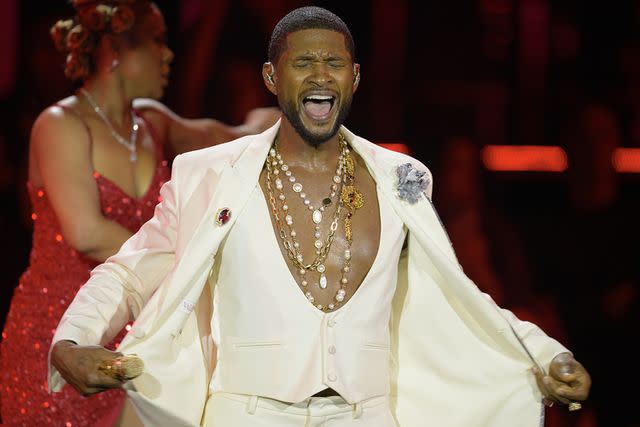 <p>Kristy Sparow/Getty</p> Usher performs onstage during his residency at La Seine Musicale on September 25, 2023 in Boulogne-Billancourt, France.