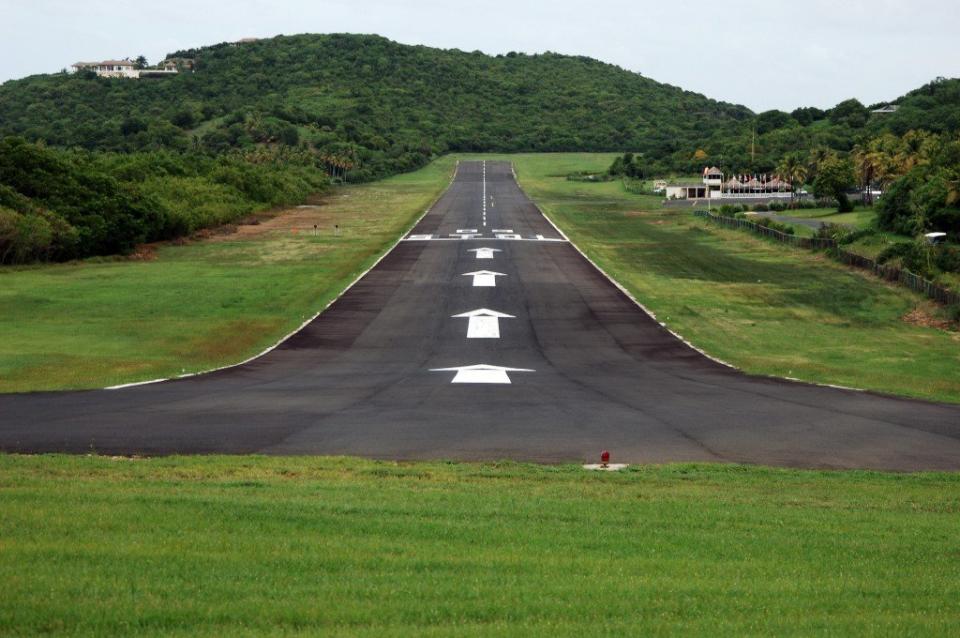 Part of the Grenadines, this secluded, private island has an adorably quaint (and, of course, chic) runway tucked neatly and calmly into grass. 