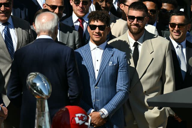 <p>SAUL LOEB/AFP via Getty</p> oe Biden faces the 2024 Super Bowl champions Kansas City Chiefs, including quarterback Patrick Mahomes (C) and tight end Travis Kelce (2nd R)