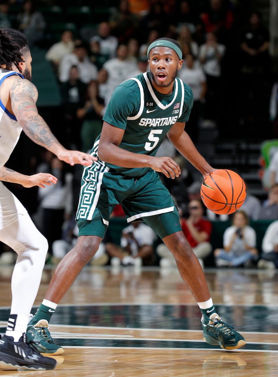 Michigan State's Tre Holloman runs the point against Grand Valley State, Tuesday, Nov. 1, 2022, in East Lansing.