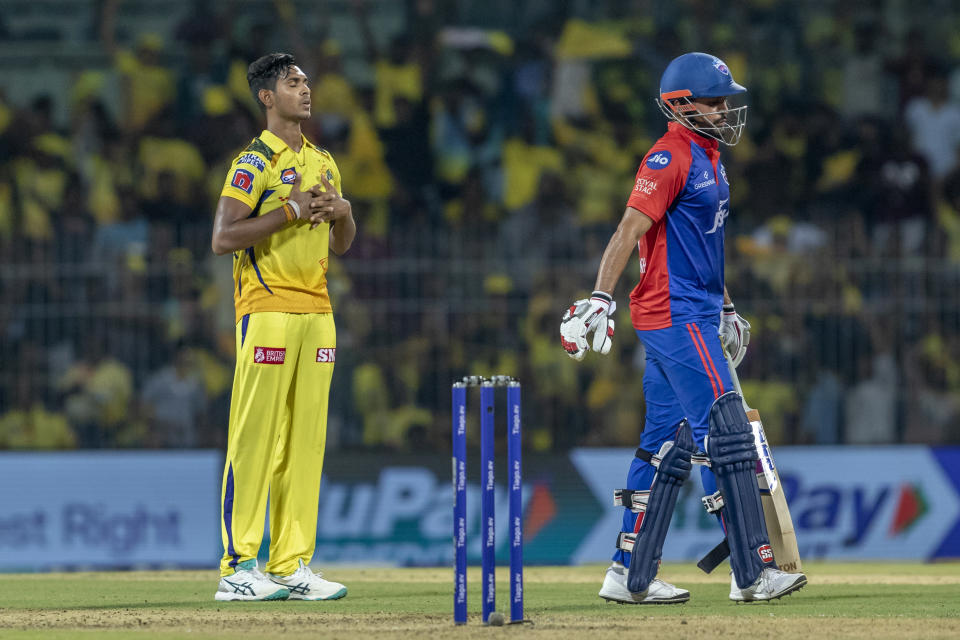 Chennai Super Kings' Matheesha Pathirana reacts after taking the wicket of Delhi Capitals' Manish Pandey, right, during the Indian Premier League cricket match between Delhi Capitals and Chennai Super Kings in Chennai, India, Wednesday, May 10, 2023. (AP Photo /R. Parthibhan)