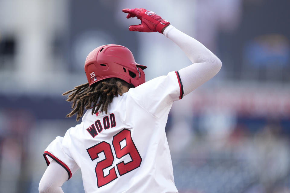 WASHINGTON, DC - JULY 06: James Wood #29 of the Washington Nationals celebrates hitting a three run home run, his first career home run home, in the second inning during a baseball game against St. Louis Cardinals at Nationals Park on July 6, 2024 in Washington, DC. (Photo by Mitchell Layton/Getty Images)