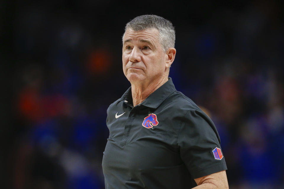 Boise State coach Leon Rice walks on to the court for a timeout during the first half of the team's NCAA college basketball game against Colorado State, Tuesday, Jan. 9, 2024, in Boise, Idaho. (AP Photo/Steve Conner)