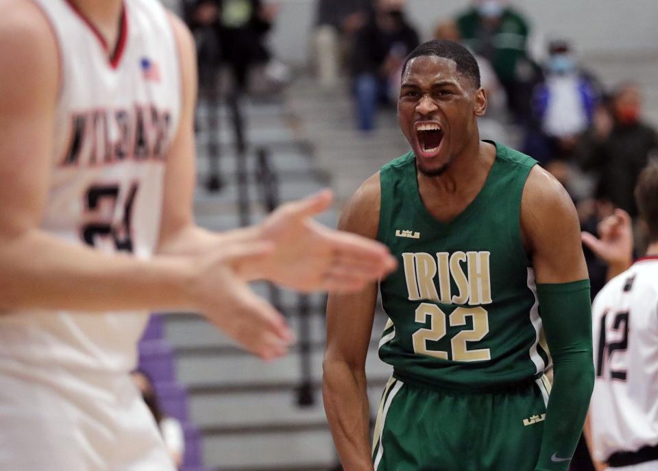 STVM's Malaki Branham celebrates during the first half of a Division II regional semifinal against Struthers, Thursday, March 11, 2021, in Barberton.