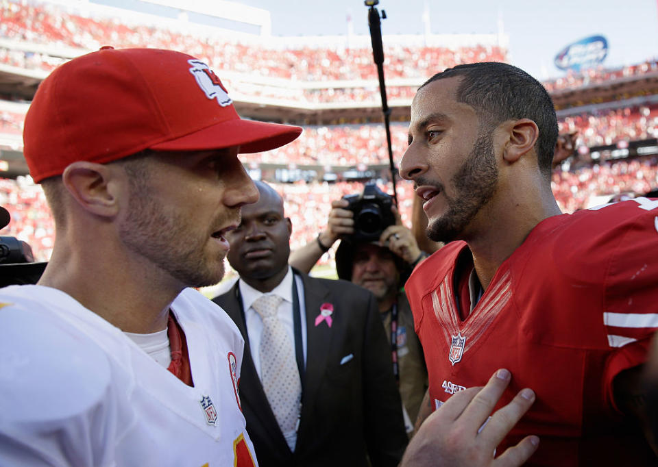 Alex Smith and Colin Kaepernick. (Getty)