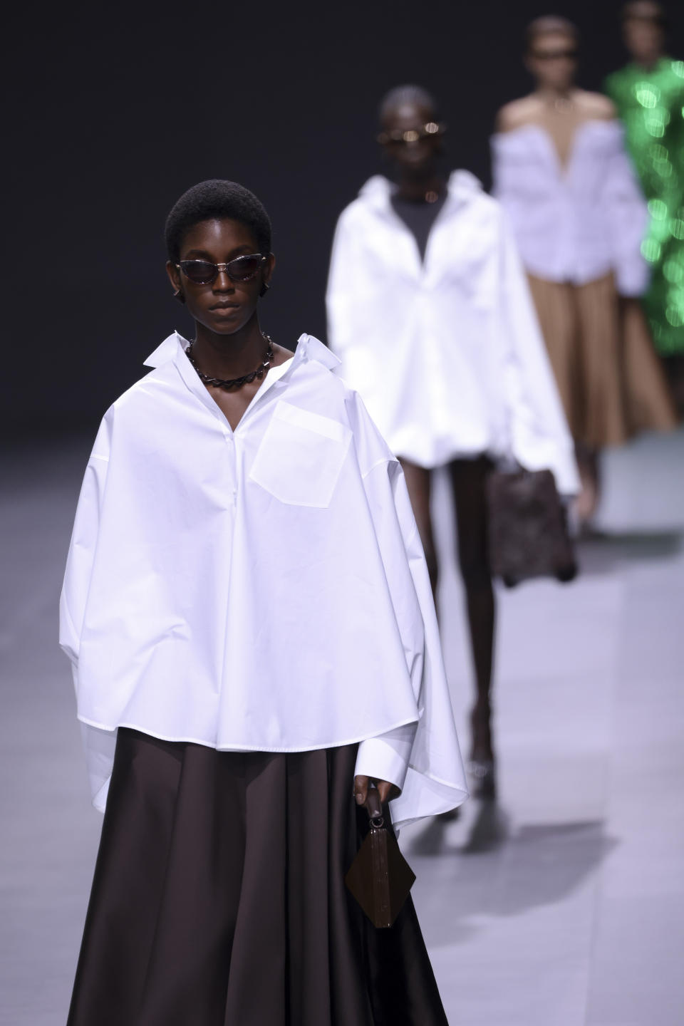 A model wears a creation for the Valentino ready-to-wear Spring/Summer 2023 fashion collection presented Sunday, Oct. 2, 2022 in Paris. (Photo by Vianney Le Caer/Invision/AP)