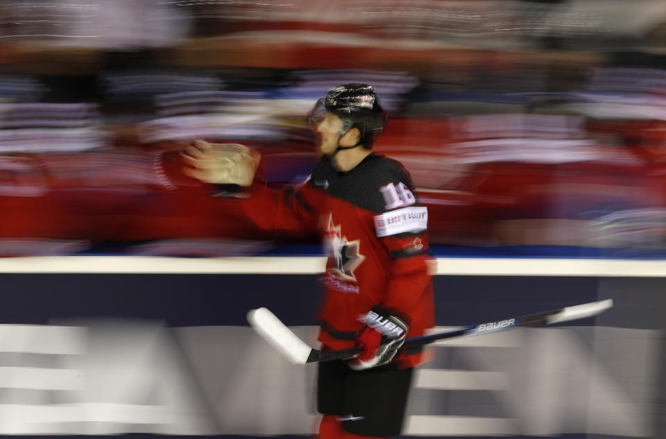 Canada's Jared McCann, right, celebrates after scoring his sides third goal during the Ice Hockey World Championships group A match between Canada and the United States at the Steel Arena in Kosice, Slovakia, Tuesday, May 21, 2019. (AP Photo/Petr David Josek)