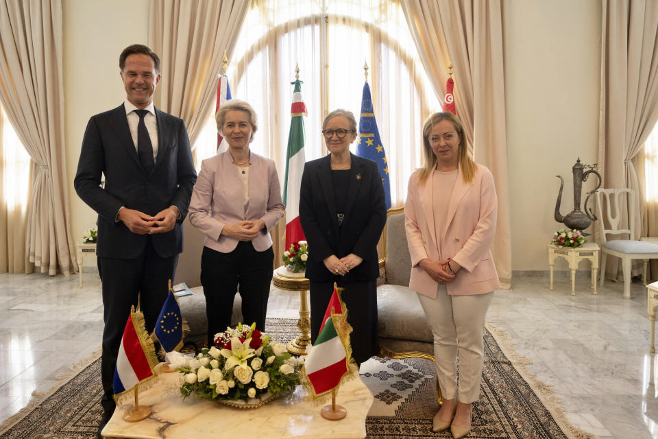 From left, Dutch Prime Minister Mark Rutte, European Commission President Ursula von der Leyen, Tunisian Prime Minister Najla Bouden, and Italian Premier Giorgia Meloni meet in Tunis, Sunday, June 11, 2023. Tunisia's president is hosting the leaders of Italy, the Netherlands and the European Union for talks aimed at smoothing the way for an international bailout. The European leaders want to restore stability to a country that has become a major source of migration to Europe. (Italian Premier Office via AP, ho)