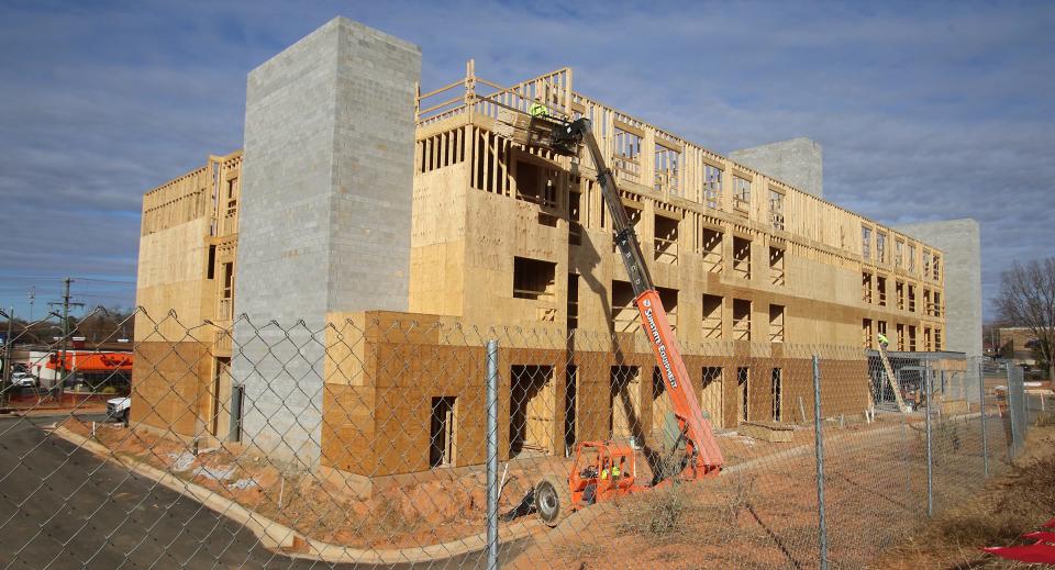 Construction continues on a new hotel on North New Hope Road Tuesday morning, Dec. 7, 2021.