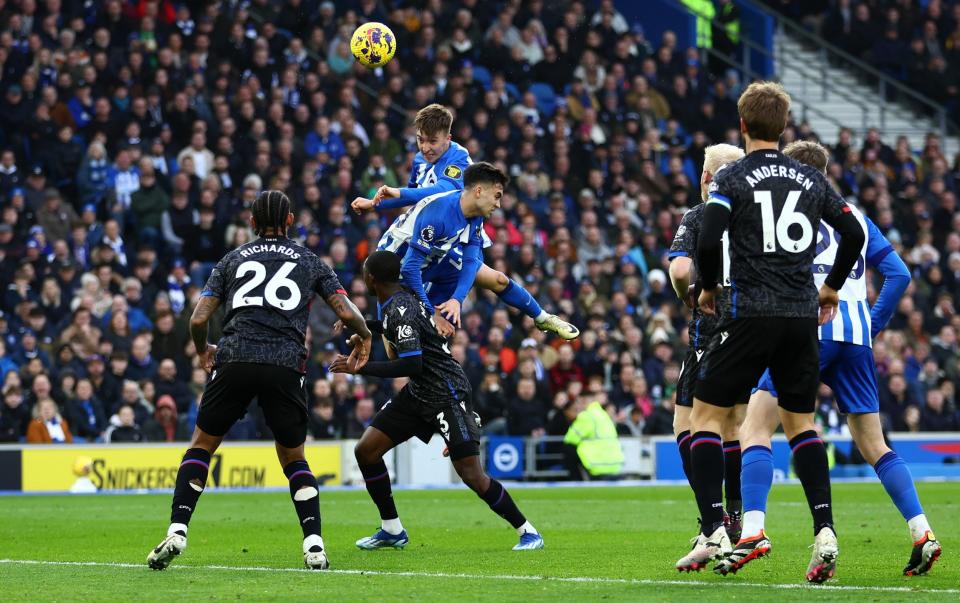 Jack Hinshelwood rises to head home Brighton's second against Crystal Palace