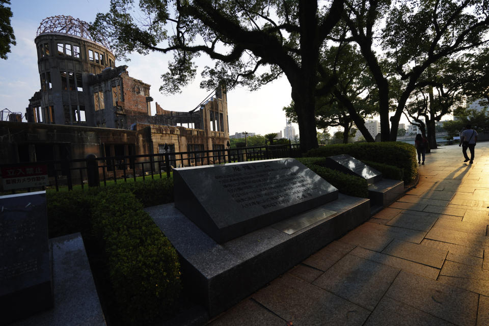 The Atomic Bomb Dome is seen at dusk in Hiroshima, western Japan, Sunday, Aug. 2, 2020. The city of Hiroshima on Thursday, Aug. 6 marks the 75th anniversary of the world's first nuclear attack. (AP Photo/Eugene Hoshiko)