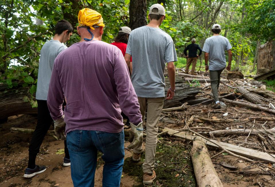 Volunteers with Spearhead Project Earth doing their weekly cleanup of Burlington Island on the Delaware River in between New Jersey and Pennsylvania on Thursday, Aug. 10, 2023.