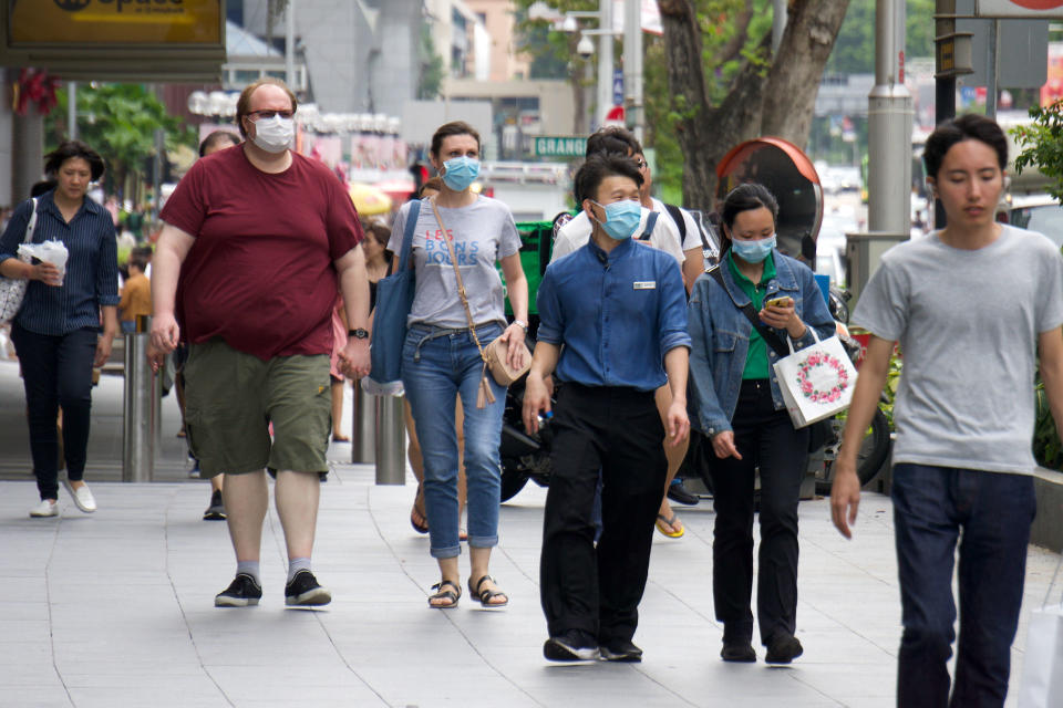 People seen wearing face masks along Orchard Road on 9 February 2020. (PHOTO: Dhany Osman / Yahoo News Singapore)