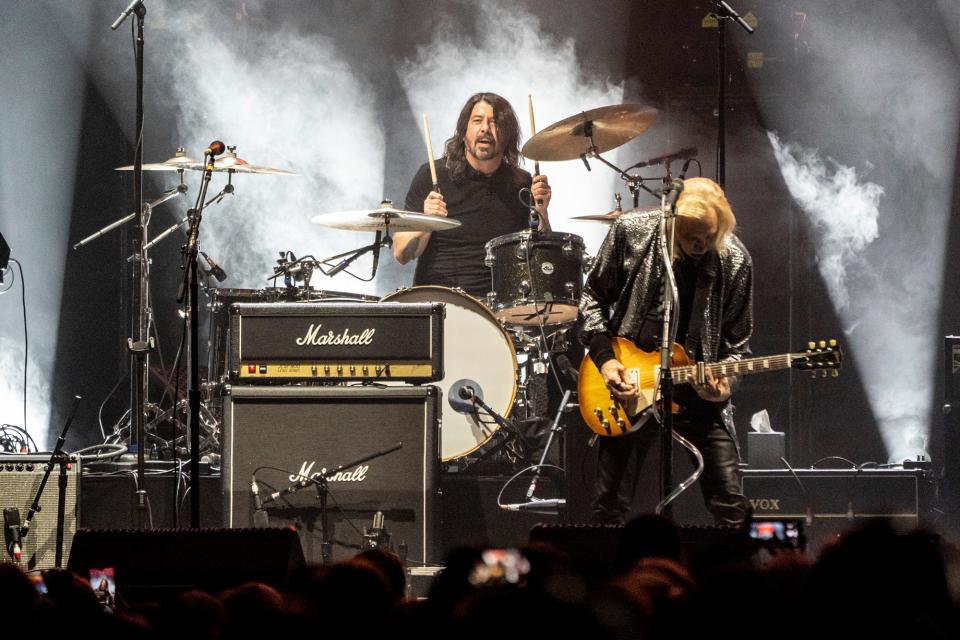 Dave Grohl, left, and Joe Walsh perform at 6th Annual VetsAid Concert at Nationwide Arena on Sunday, Nov. 13, 2022, in Columbus, Ohio. (Photo by Amy Harris/Invision/AP)