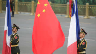 Members of honour guards holding Chinese and French flags attend a welcoming ceremony for French President Emmanuel Macron at the Great Hall of the People in Beijing, China November 6, 2019. REUTERS/Jason Lee